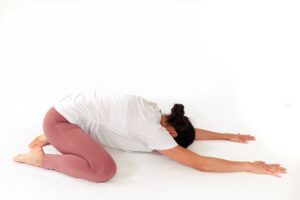woman demonstrating childs pose