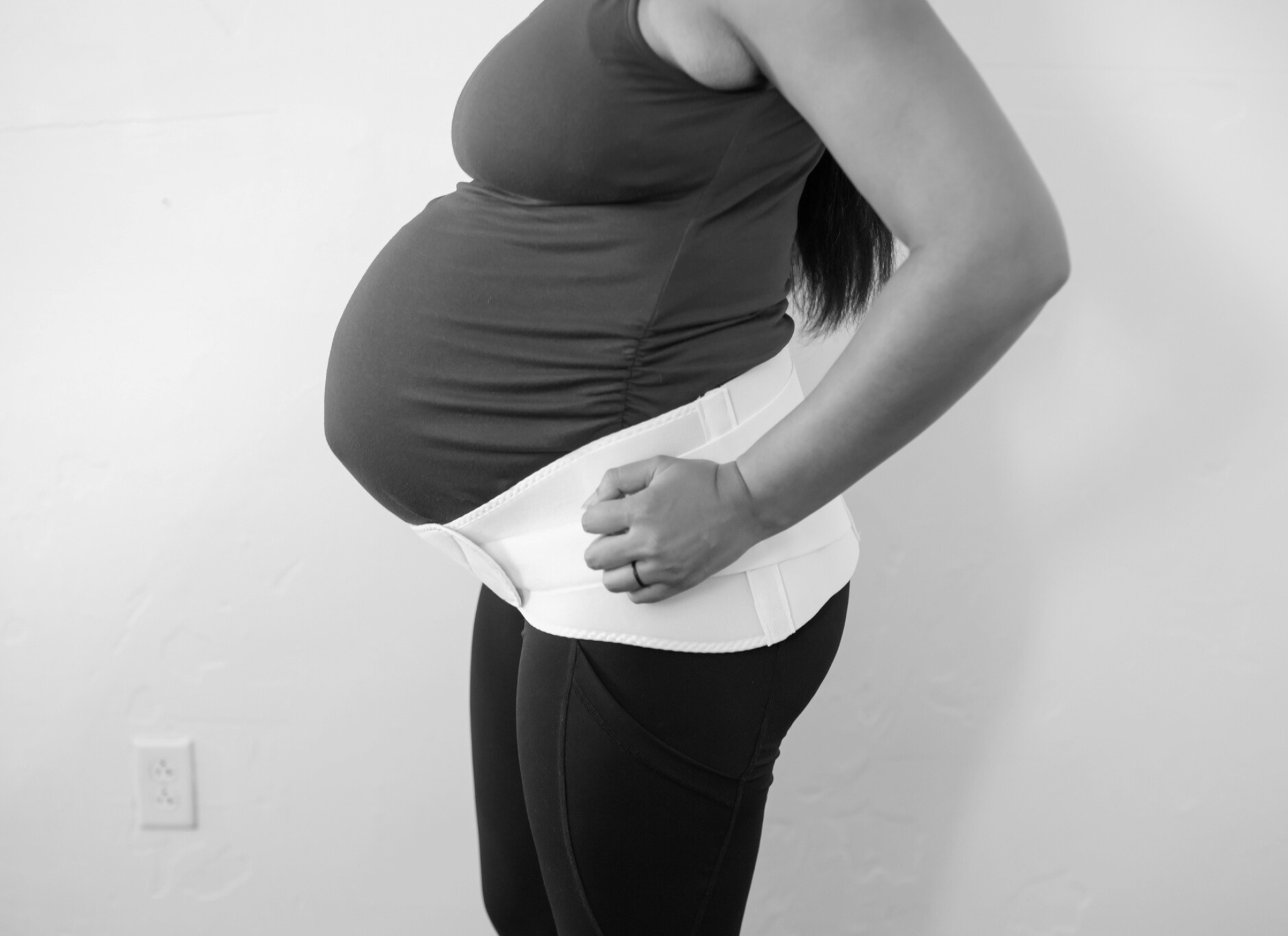 pregnant woman wearing belly support