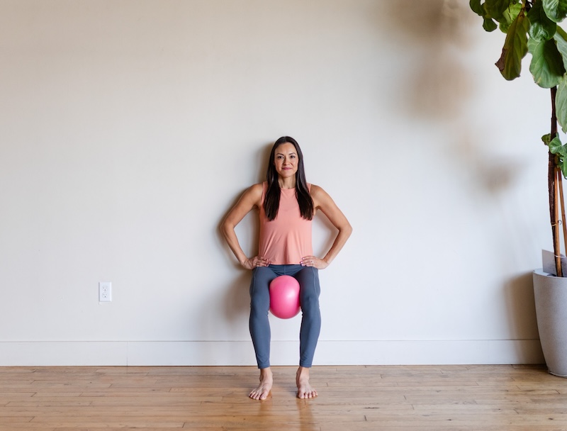 wall sit with ball squeeze